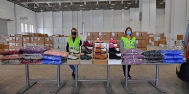 İzmir Büyükşehir Belediyesi öğrenci bot ve mont yardımı başladı